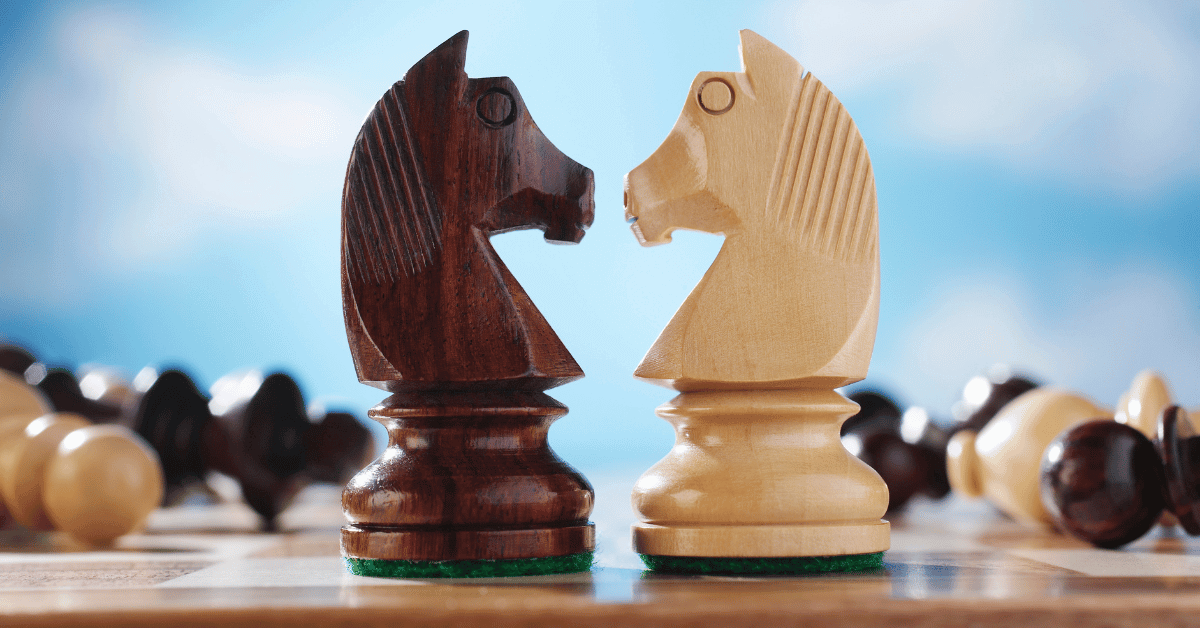 chess pieces two knights face to face